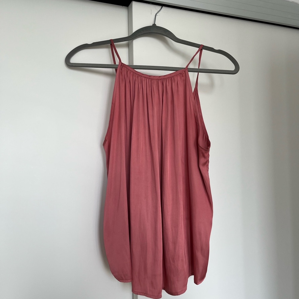 Pink flowy tank top with pink stone details